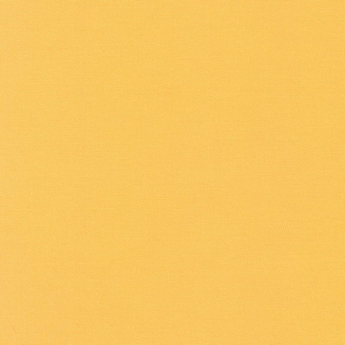 Daffodil Kona Solid Cotton by Robert Kaufman - Sold By 1/4yd