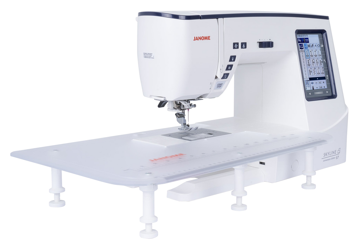 Janome Skyline S7 Anniversary Edition sewing and quilting machine with extension table