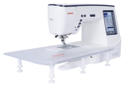 Janome Skyline S7 Anniversary Edition sewing and quilting machine with extension table